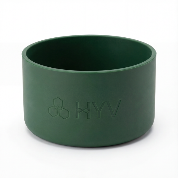HYV silicone bottle boot in forest green, embossed with the HYV mark