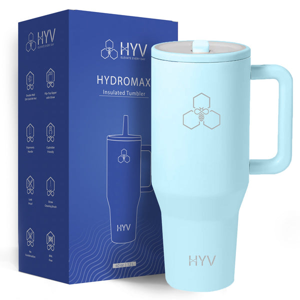 HYV HydroMax 1.2 litre tumbler in sky blue, beside its blue retail box