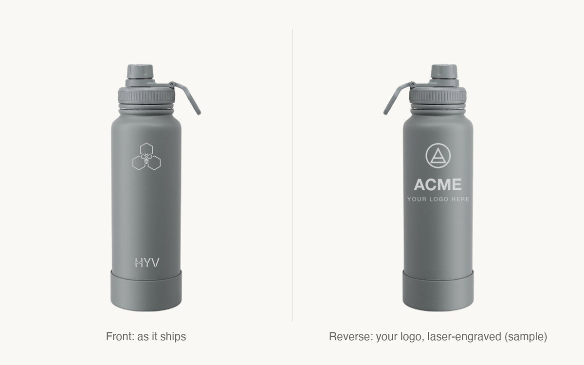 The front of a HYV bottle as it ships, beside its reverse with a sample ACME logo laser-engraved
