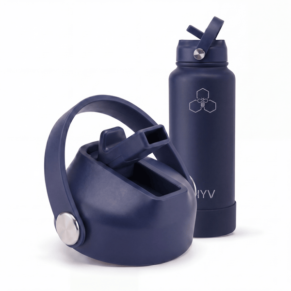 HYV flip-top sipper lid in indigo navy, shown in front of a matching 1 litre bottle