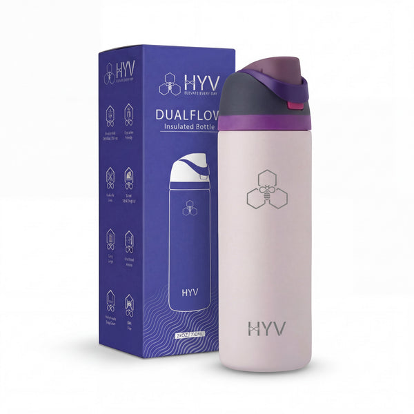 HYV DualFlow 750ml bottle in blush nude, beside its purple retail box