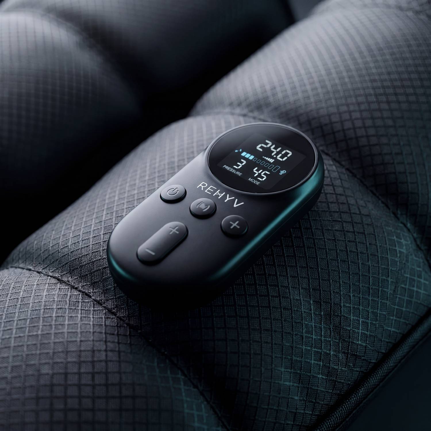 ReHYV Pulse Pro wireless remote — pressure, time and mode controls in hand